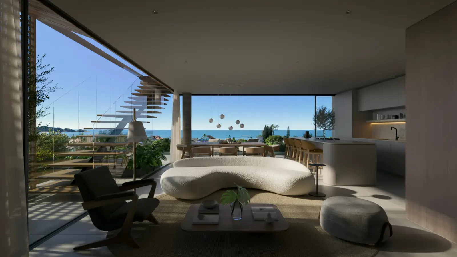 Living integrado à varanda de uma unidade de 3 suítes, com vista para o mar